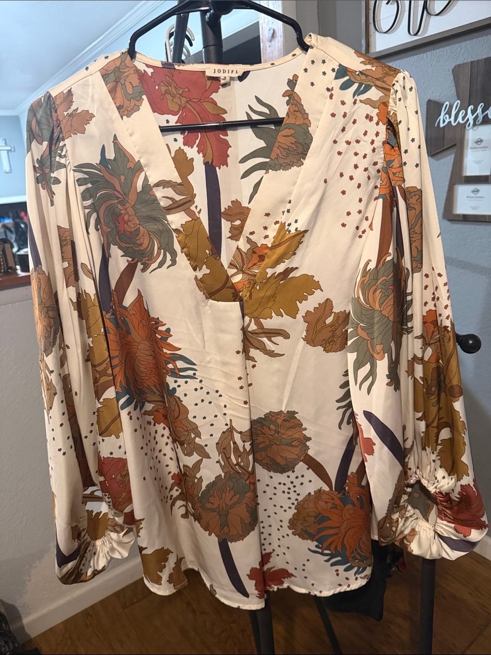 JODIFL Cream Floral V-Neck Blouse with Rust, Olive & Teal Accents